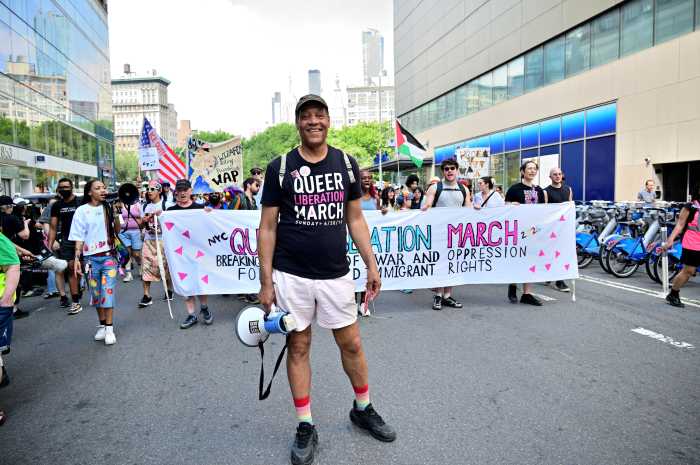 Jay W. Walker leads the Queer Liberation March