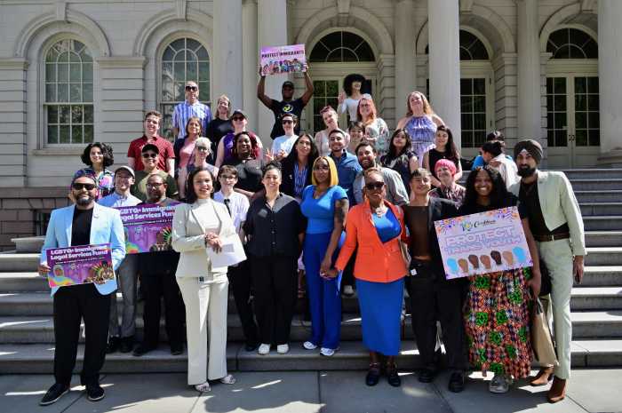A group shot on the steps of City Hall.