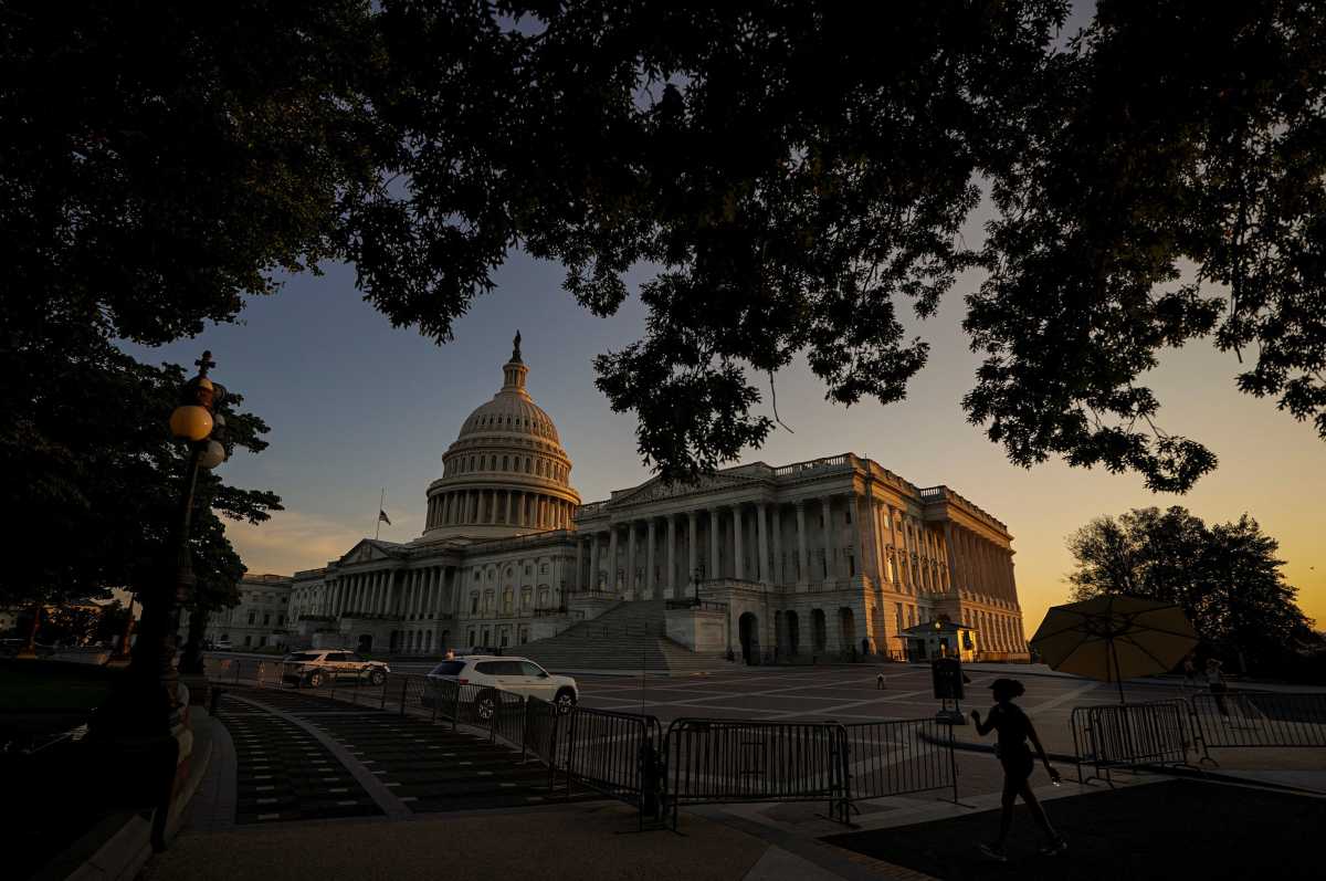 The sunlight falls on the U.S. Capitol as the sun sets in Washington, D.C., U.S., July 13, 2026.