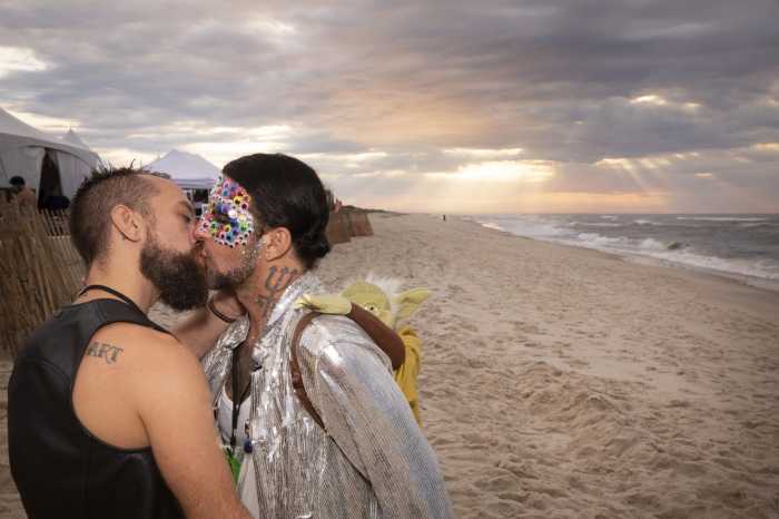 A kiss on the beach in Fire Island.